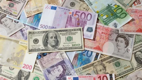 Fed toplantısı ərəfəsində dollar ucuzlaşır, Yapon və Fransanın monetar siyasətləri 