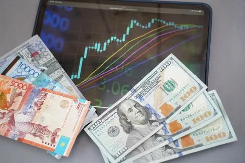 Asiya valyutaları dolların sabitləşməsinə görə fərqli istiqamətlərdə